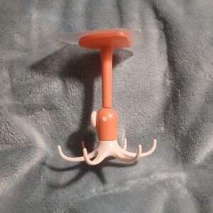 Orange and Peach Rotating Utensil Hanger